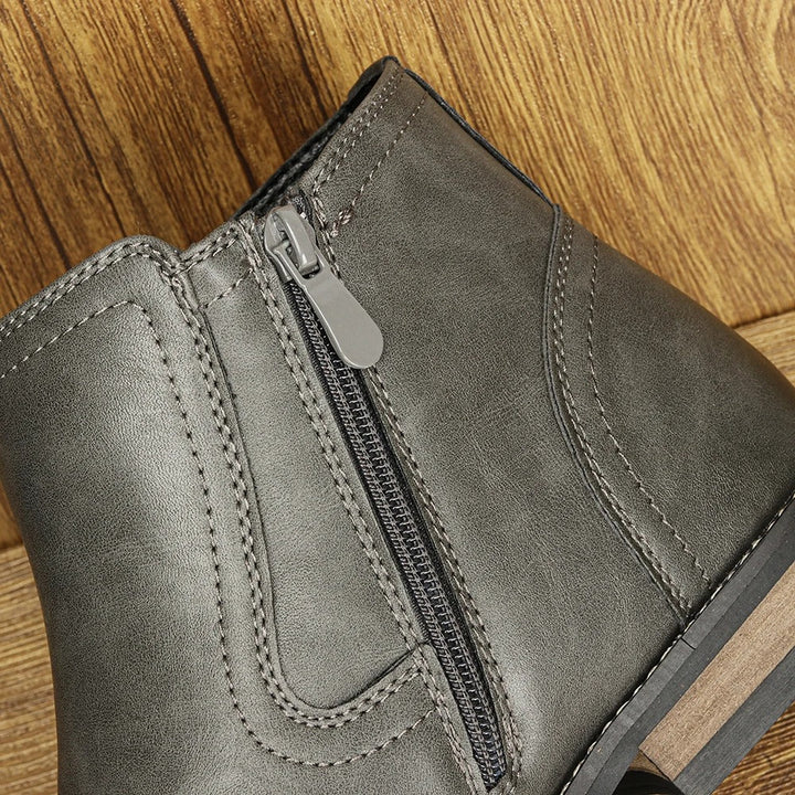 Men's dress Chelsea boots in black with a practical side-zip, offering both elegance and comfort.