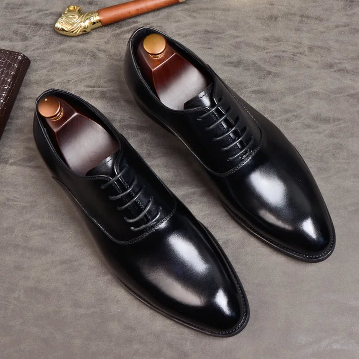 Professional men's comfortable black Oxford shoes, ideal for daily office wear and business casual outfits.