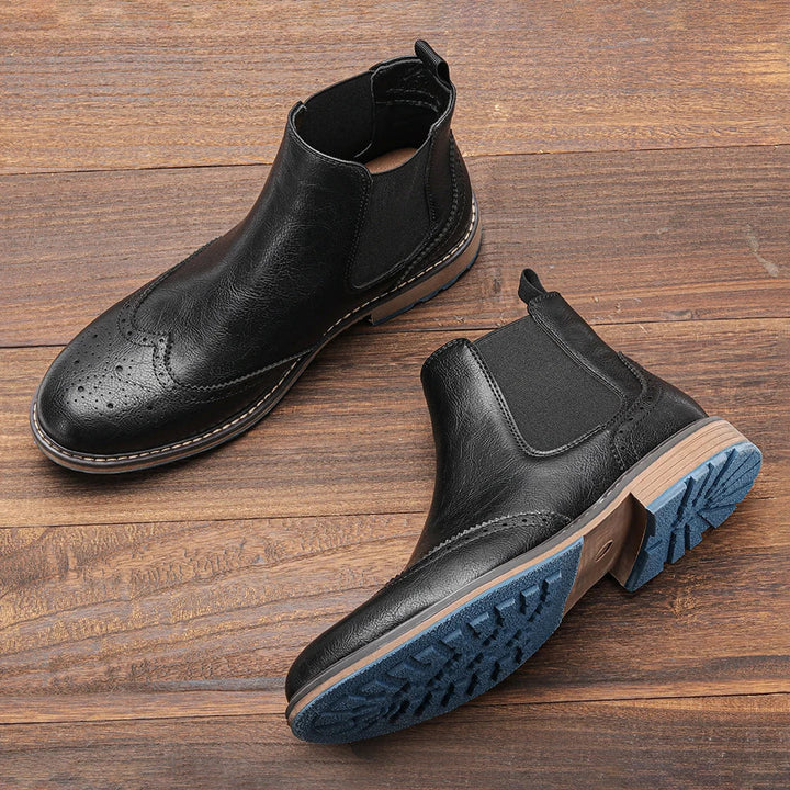 Men's classic black leather slip-on Chelsea boots, perfect for versatile daily wear & mens fashion.