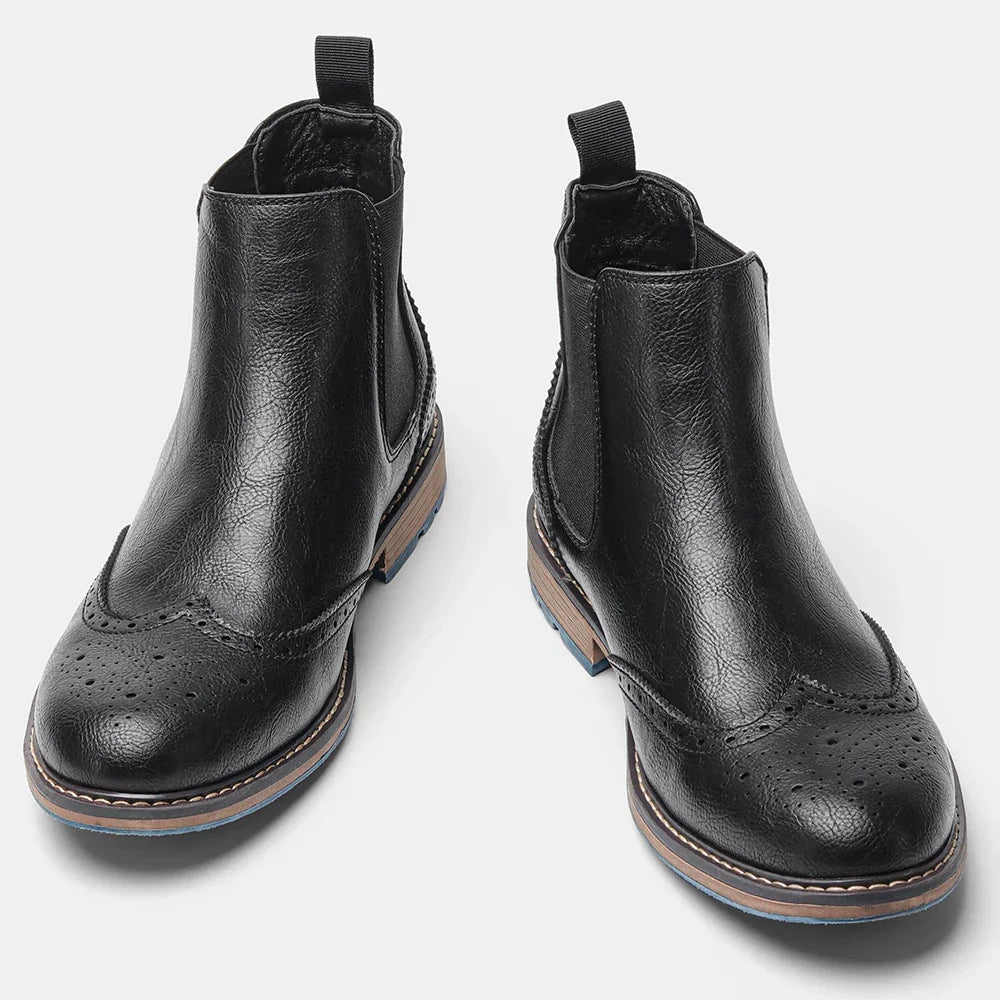 Close-up of a men's classic slip-on Chelsea boot, highlighting the quality leather and sleek design.