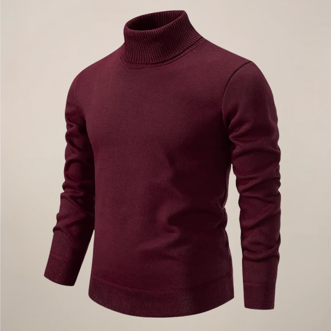 Folded men's dark green turtleneck sweater, showcasing its soft knitwear and timeless design.