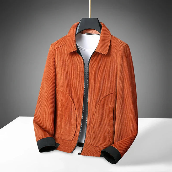Close-up of a men's classic corduroy jacket showcasing its unique textured fabric, a timeless fall fashion piece.