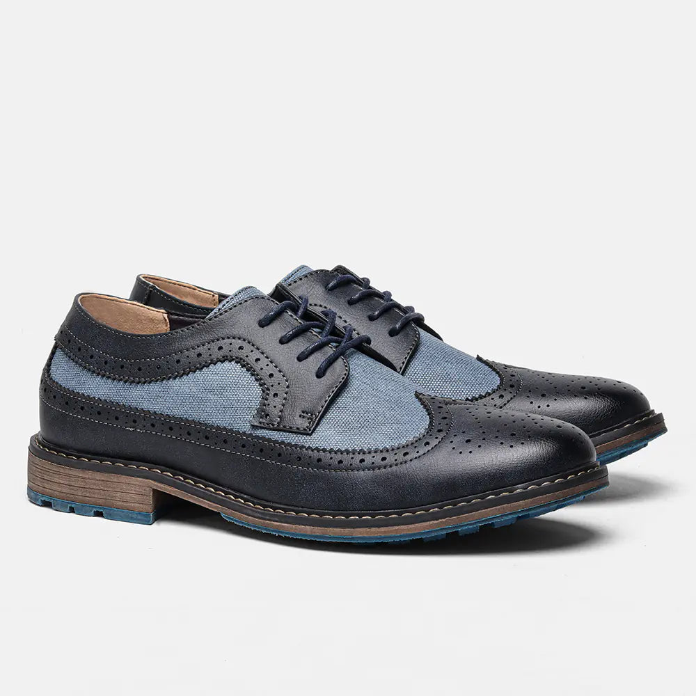 Stylish men's black brogue dress shoes with a polished finish, essential formal men's fashion footwear