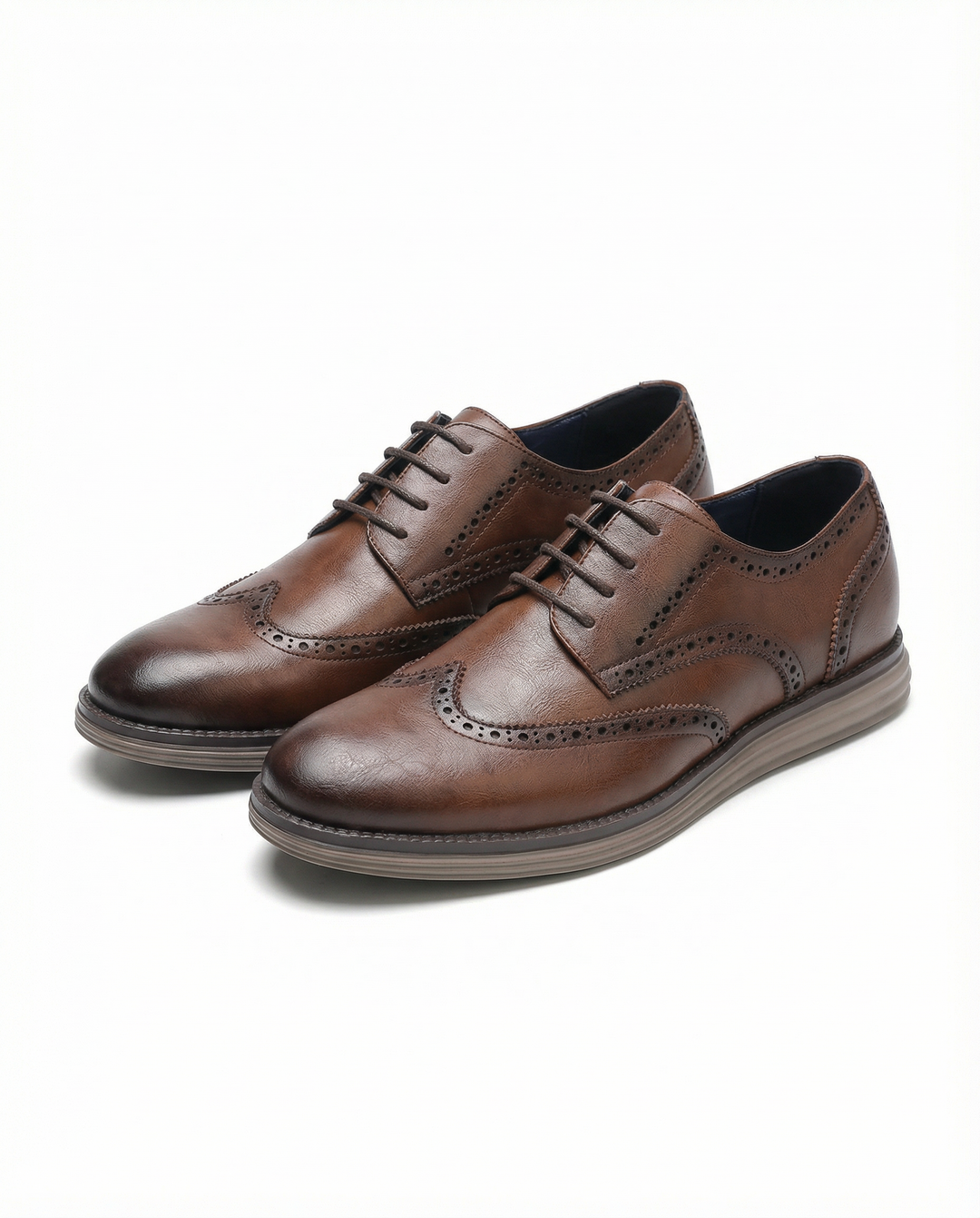 Men's classic brown leather brogue oxford dress shoes for formal and business casual outfits.