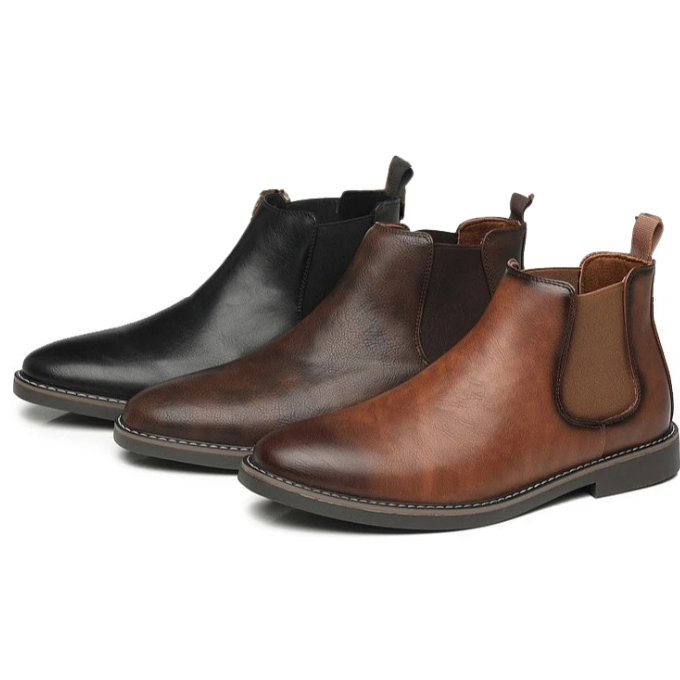 Men's slip-on classic black leather Chelsea boots, versatile and durable footwear.