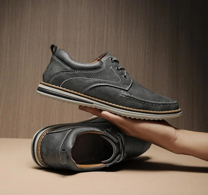 Durable black leather moc toe Oxford shoes for long-lasting wear