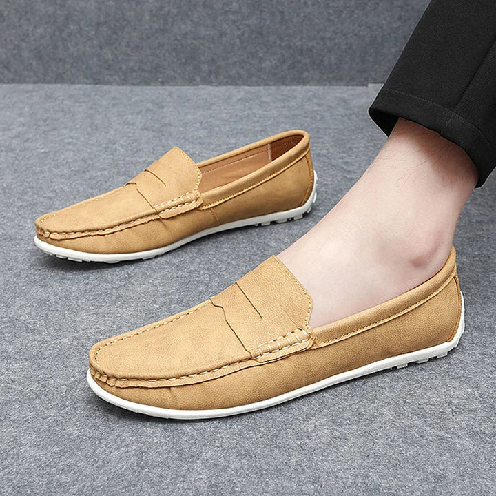 Durable men's leather penny loafers, designed for long-lasting wear and fashion.