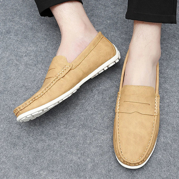 Versatile men's black leather penny loafers, a staple for any wardrobe.
