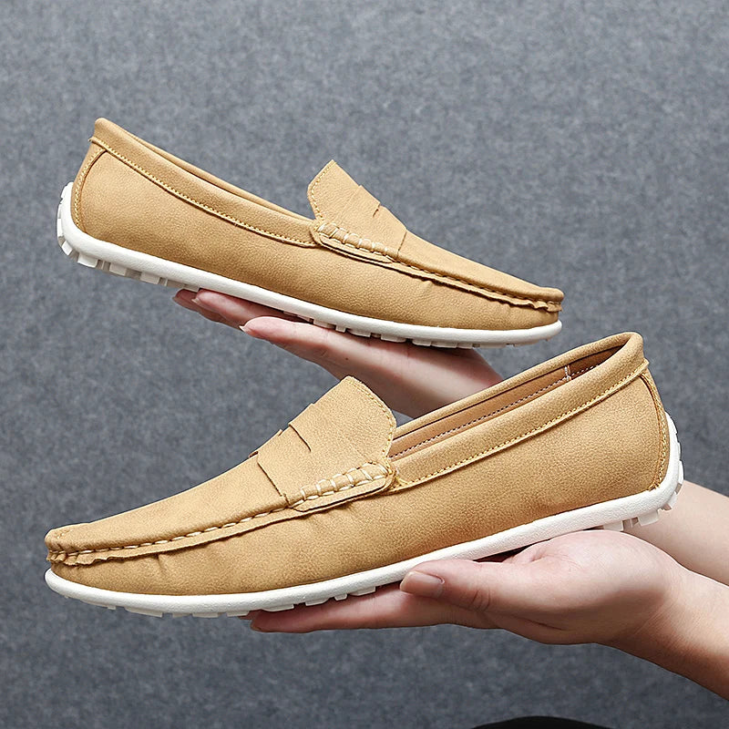 Men's dressy leather penny loafers, suitable for formal and semi-formal events.