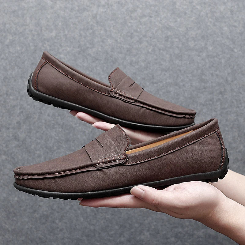 Traditional men's leather penny loafers, embodying classic men's fashion.
