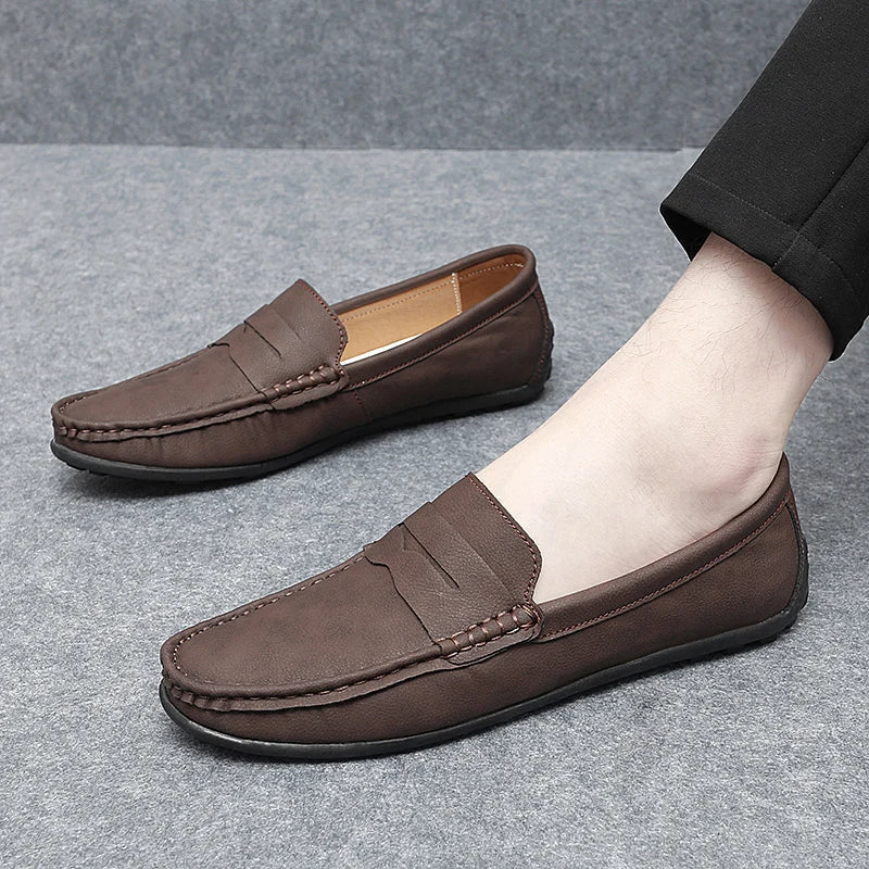 Men's premium brown leather penny loafers, a symbol of timeless elegance.