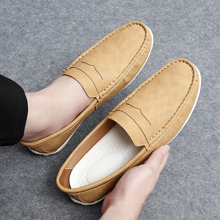 Men's polished leather penny loafers, perfect for adding a touch of class.