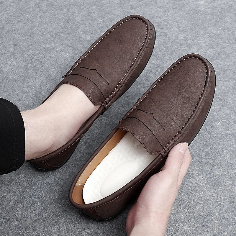 Comfortable men's leather penny loafers, featuring a soft sole for all-day wear.
