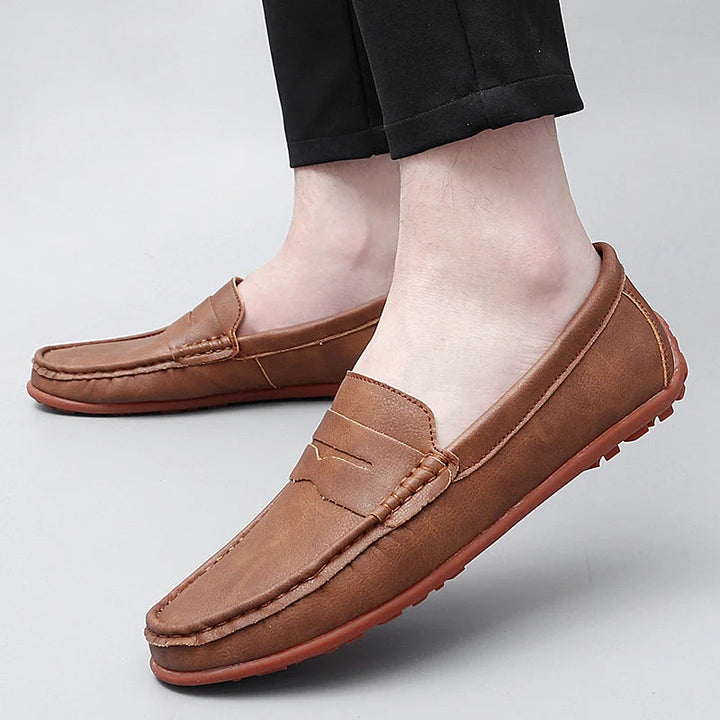 Men's comfortable leather slip-on penny loafers, great for everyday wear.