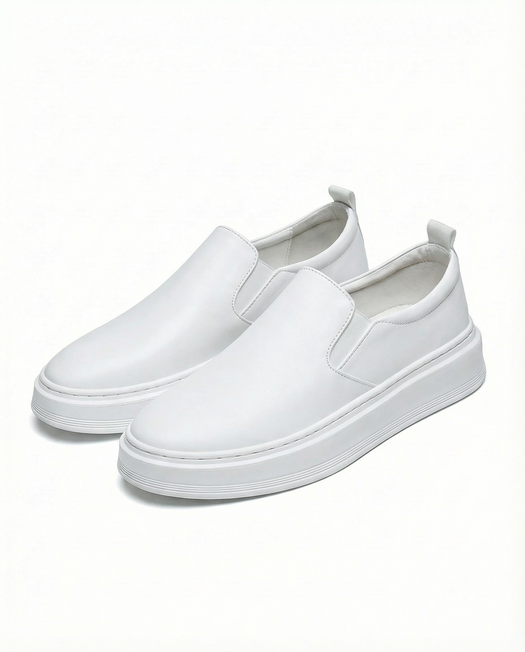 High-angle view of men's brown leather slip-on loafers, emphasizing their classic and functional appeal