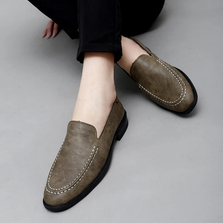 Casual yet refined men's leather slip-on shoes, offering all-day comfort