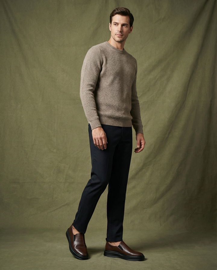 Pair of men's leather slip-on loafers in white, ideal for versatile everyday casual styling