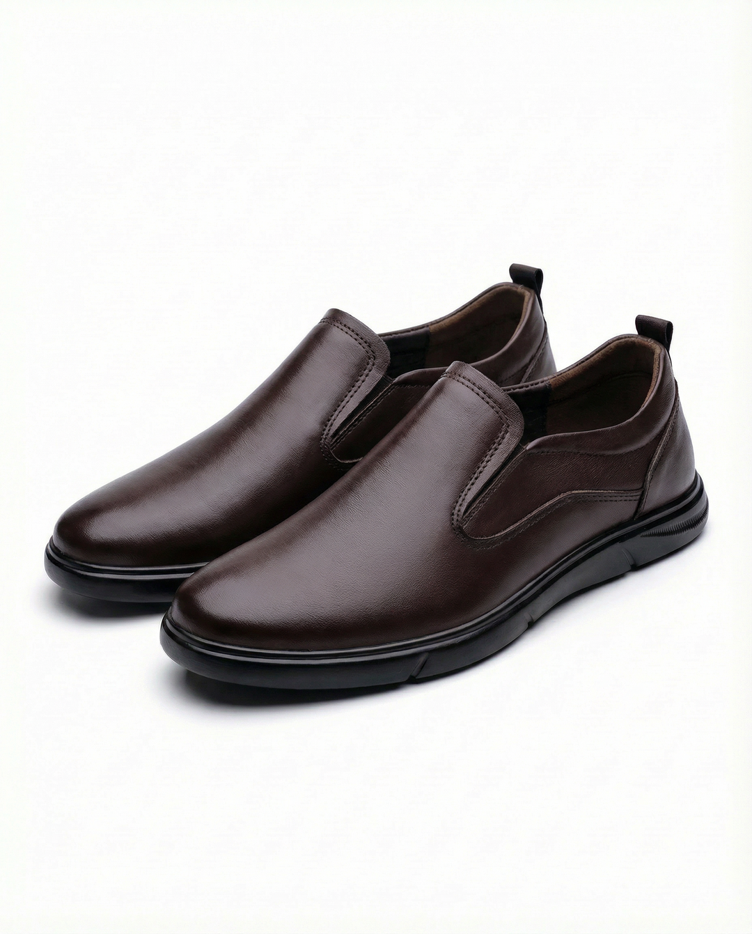 Casual yet sophisticated men's leather slip-on loafers in a rich, deep brown hue.