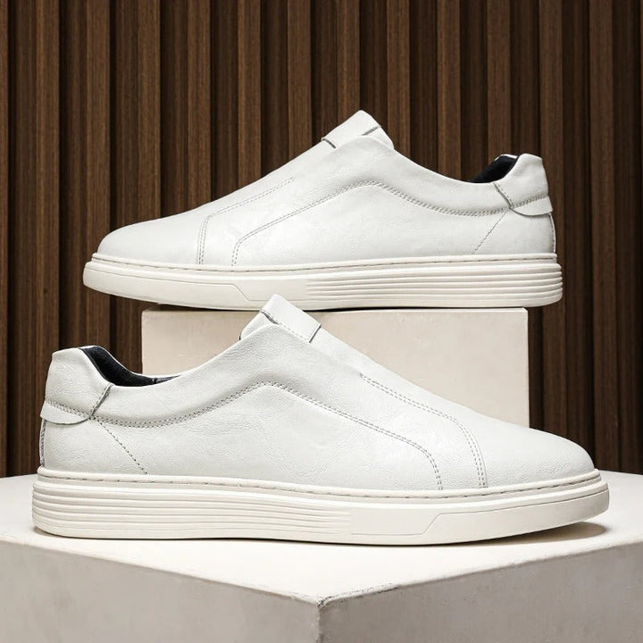 Detail shot of the comfortable sole on men's leather slip-on shoes, ensuring all-day wearability.
