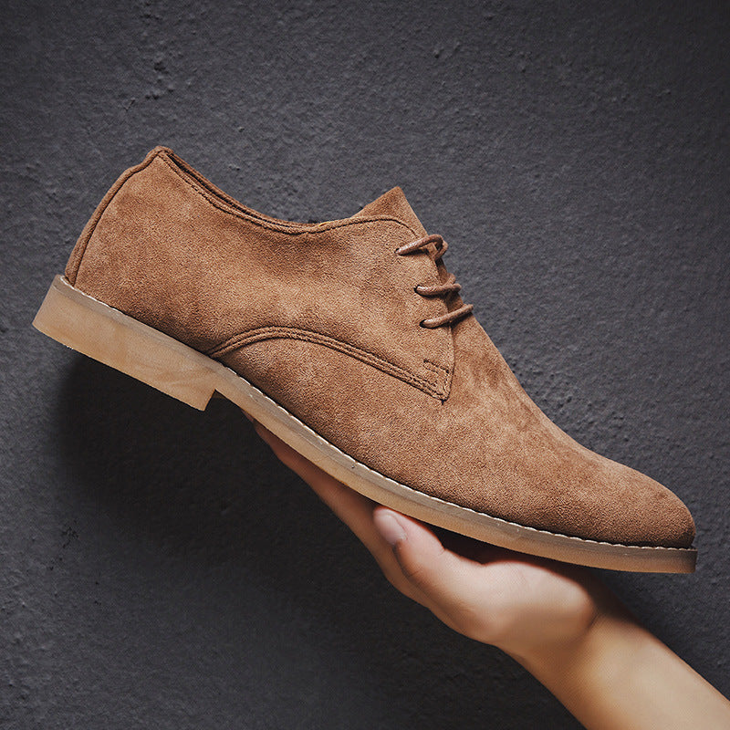 Men's classic brown suede Oxford dress shoes, perfect for business or smart casual wear.