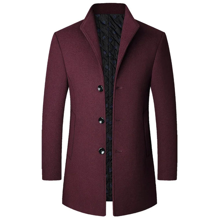 Stylish dark men's button-front long overcoat, a timeless piece for any winter wardrobe.