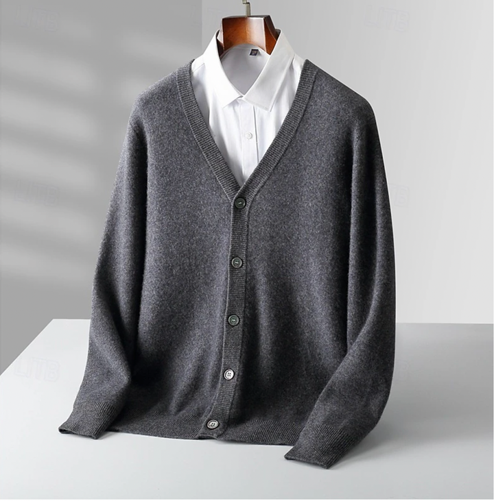 Men's classic button-up cardigan in a refined knit. A versatile layering piece for polished smart casual mens fashion.