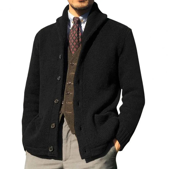 Men's classic cable knit button-front cardigan in a rich navy color, perfect for fall fashion.