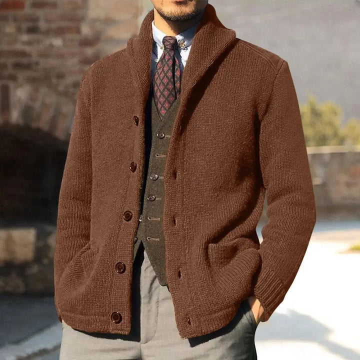 Versatile men's fall fashion: a cozy cable knit button-front cardigan in a neutral tone, paired easily.