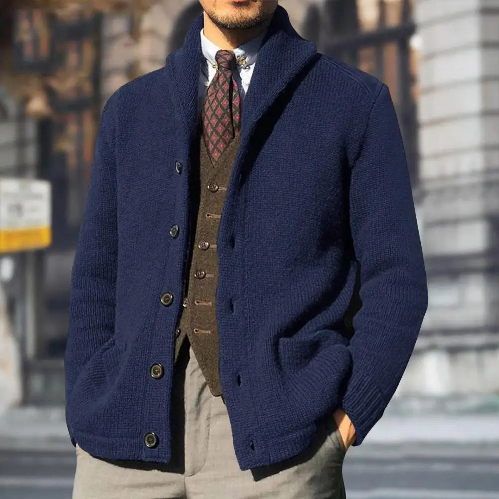 Front view of a well-fitted men's cable knit button-front cardigan, highlighting its elegant drape.