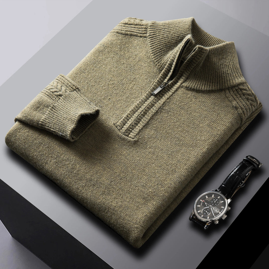 Men's classic cable knit quarter-zip sweater in a warm wool blend, perfect for winter layering.