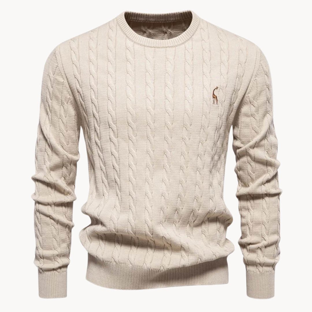 Man wearing a timeless gray cable knit sweater, ideal for a warm and stylish winter fashion look.