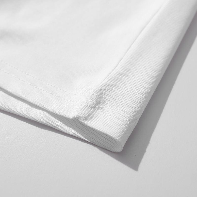 Stack of men's casual polo shirts in various colors, showcasing classic comfort