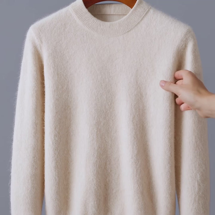 Detailed shot of the crewneck collar on a men's cashmere blend sweater, classic style