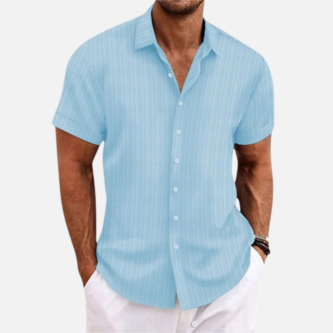 Side view: Men's short sleeve classic fit polo shirt. Versatile & comfortable design for everyday style and casual wear.