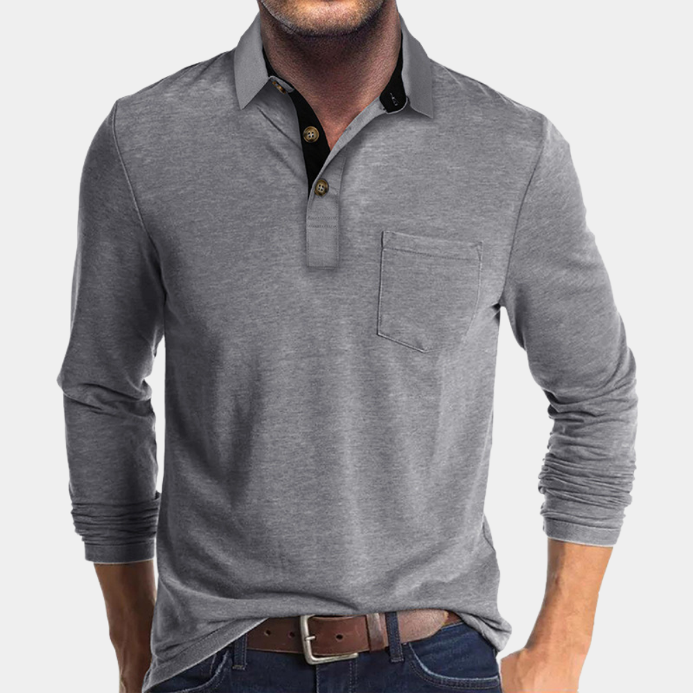 Stylish men's classic fit polo shirt. Design includes a chest pocket and button placket, perfect for versatile fashion.