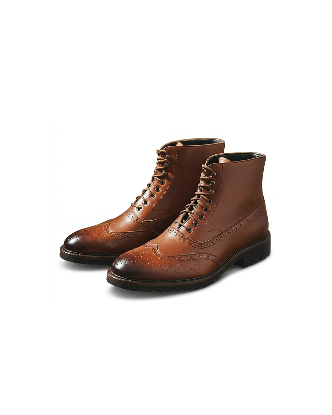 Men's classic full-grain leather ankle boots with brogue detailing and Goodyear welt construction.