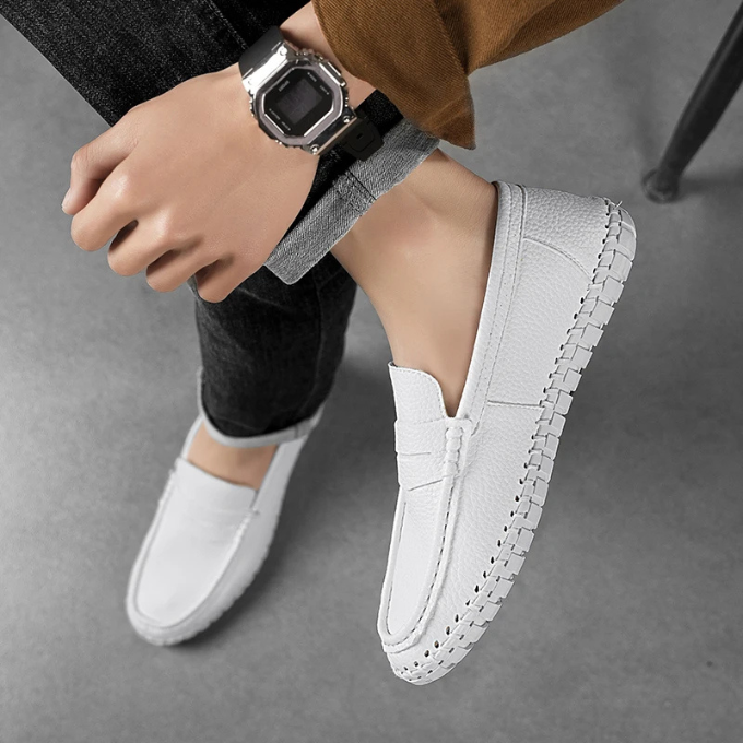 Close-up of the polished finish on men's full-grain leather slip-on loafers