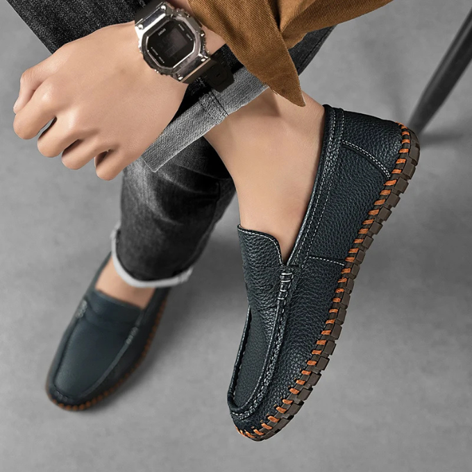 Men's full-grain leather loafers from above, showcasing their sleek, slip-on design