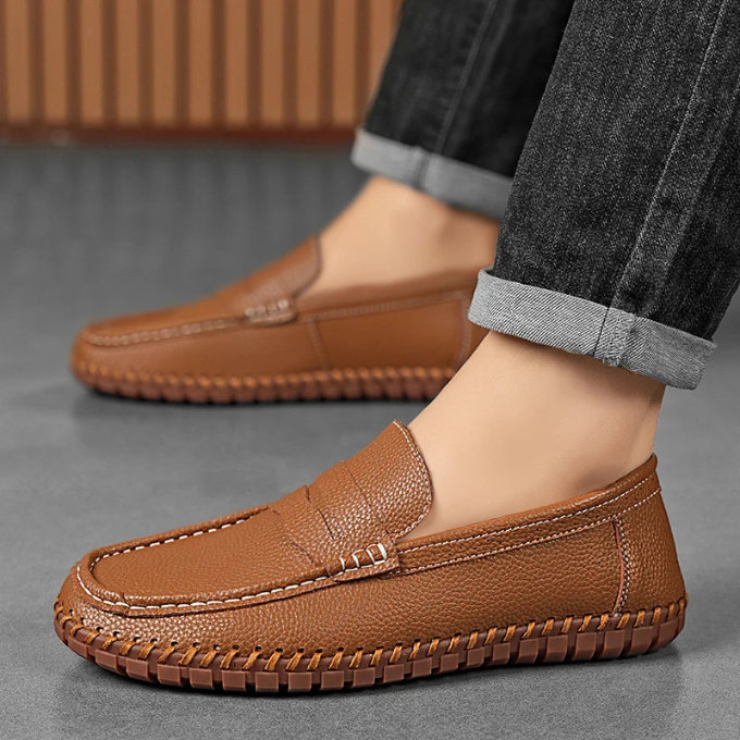 Side view of men's brown full-grain leather loafers, ideal for casual and dress shoes