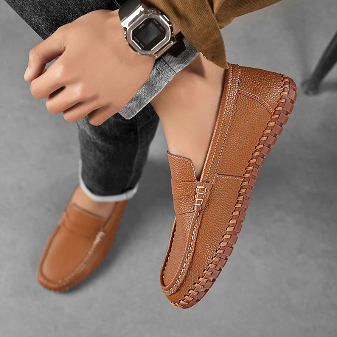 Top view of a pair of men's elegant full-grain leather moccasin loafers