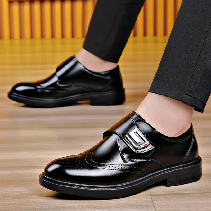 A pair of men's classic dark brown leather dress shoes, versatile for formal and business attire