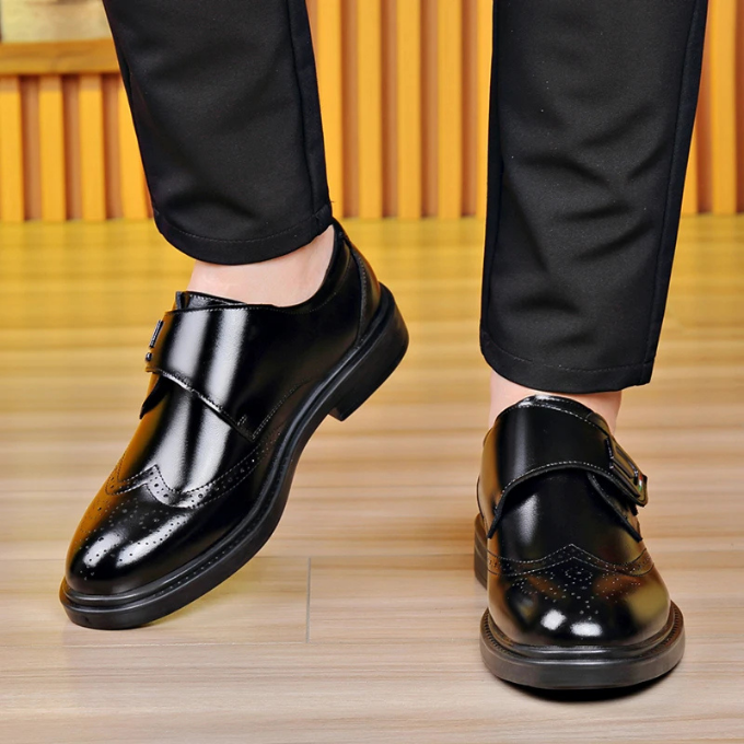 Front view of men's classic leather dress shoes, emphasizing sophisticated formal design