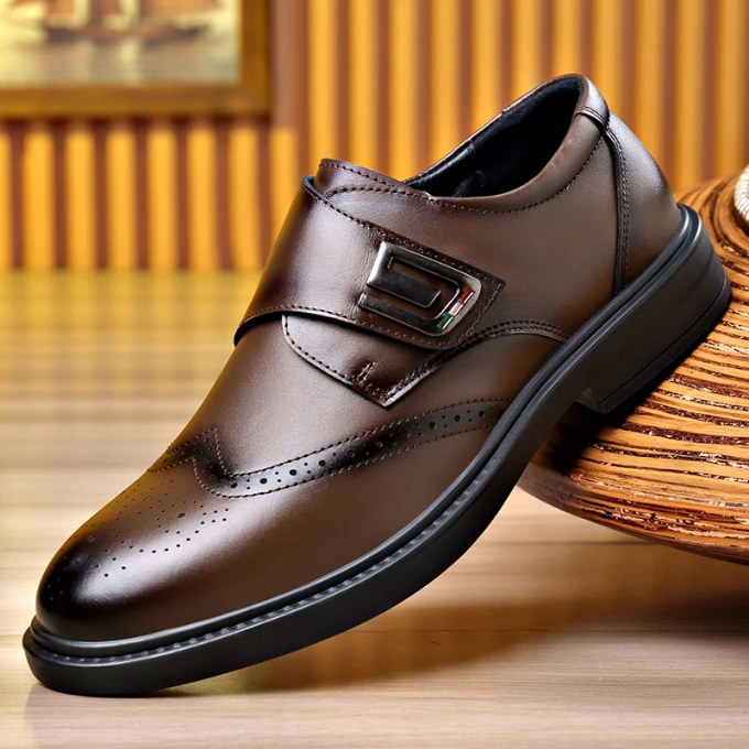Close-up of full-grain leather texture on men's classic brown dress shoes, perfect for business