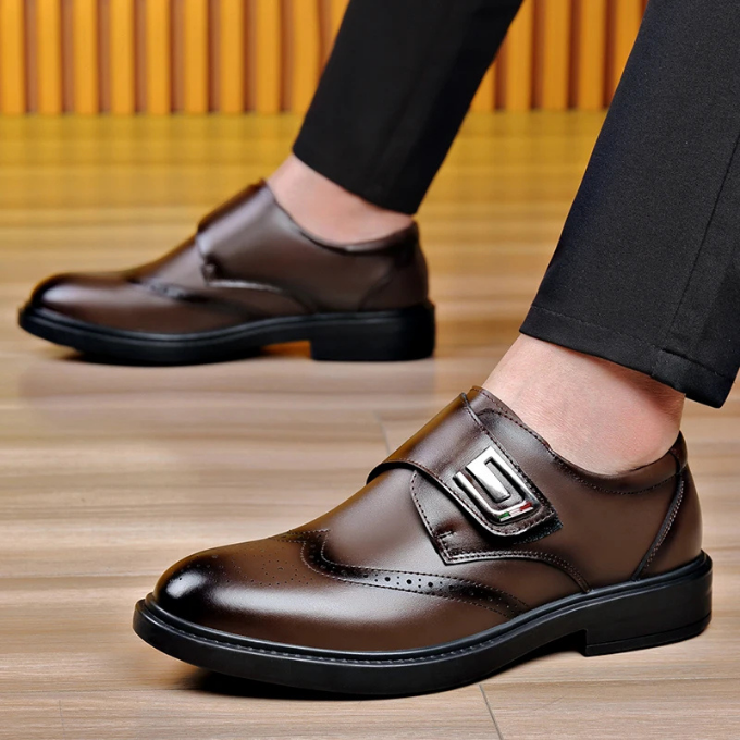 Men's classic leather dress shoes with laces tied, ready for professional and formal occasions