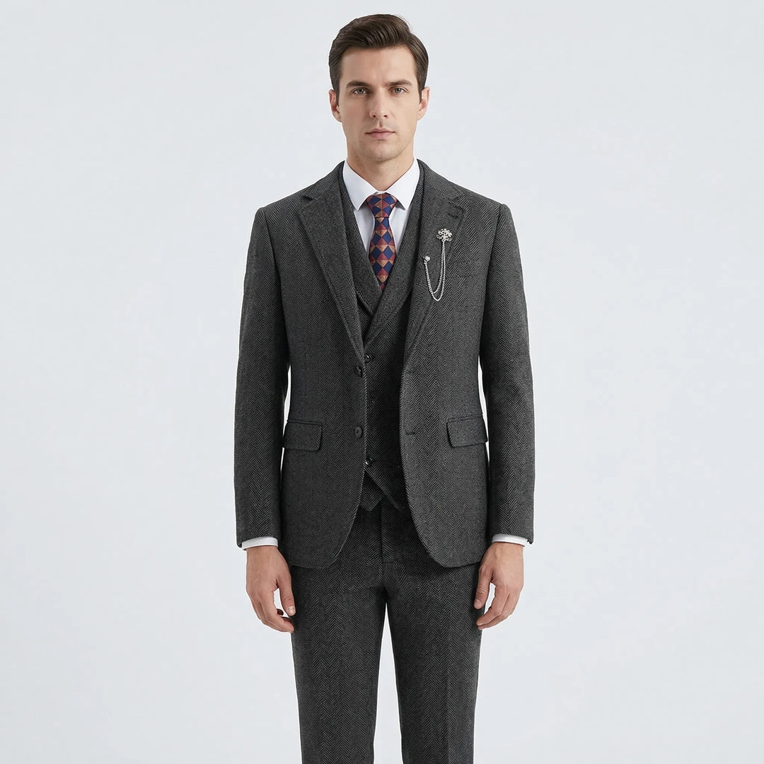 Detail of the men's tailored herringbone waistcoat (vest) from a classic 3-piece suit, essential formal attire.