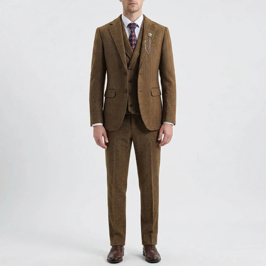 Tailored men's herringbone suit trousers, part of a sophisticated 3-piece formal wear ensemble. Classic style.