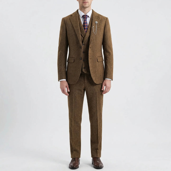 Tailored men's herringbone suit trousers, part of a sophisticated 3-piece formal wear ensemble. Classic style.