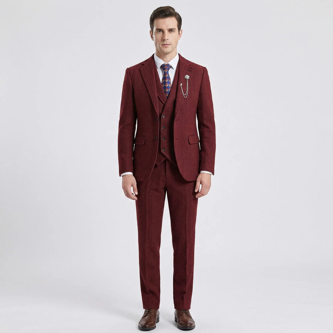 Man wearing a complete men's classic herringbone 3-piece suit, styled with shirt & tie for elegant formal events.