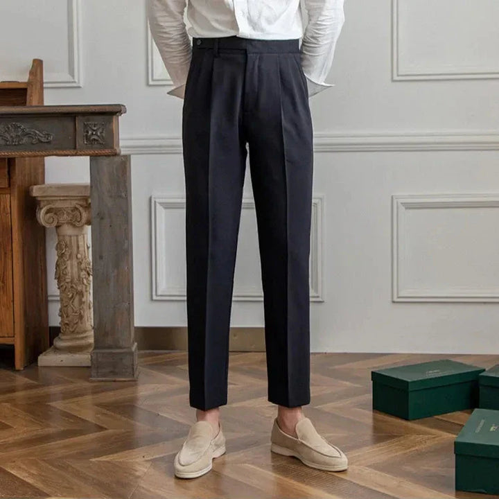 Swatches of available colors for men's tailored straight leg dress pants: black, navy, grey