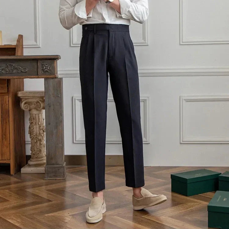 Men's straight leg dress pants presented on a hanger, emphasizing the formal wear appeal
